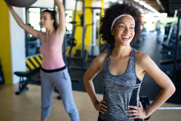 Residents working out in the 805 Riverfront fitness center